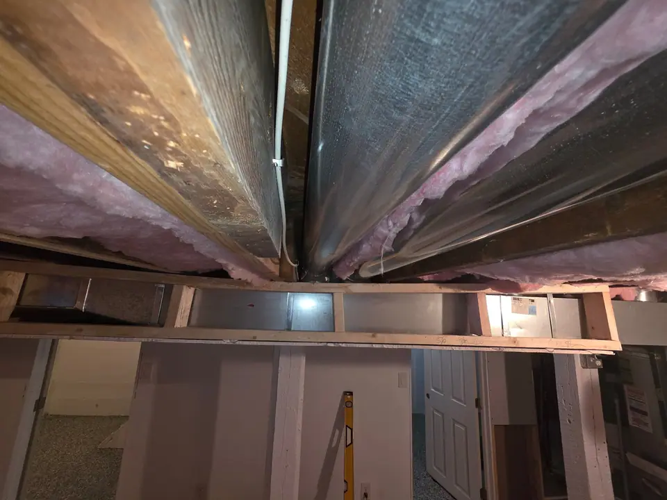 Basement ceiling: ductwork boxed in, bulkheads and drywall, photo 5 of 9 (in progress)