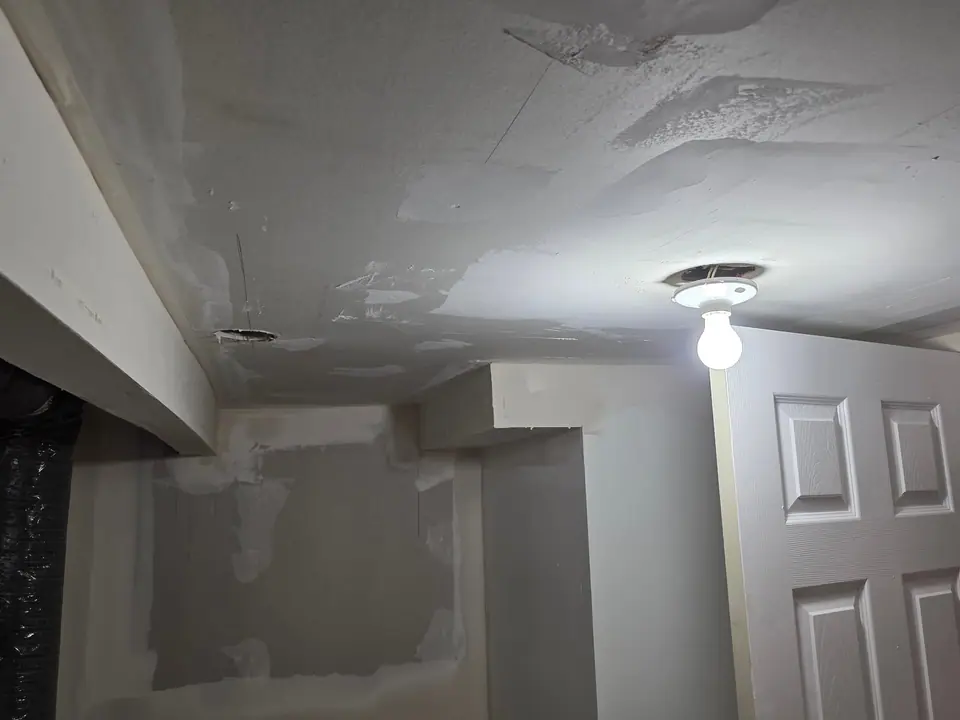 Basement ceiling: ductwork boxed in, bulkheads and drywall, photo 8 of 9 (in progress)
