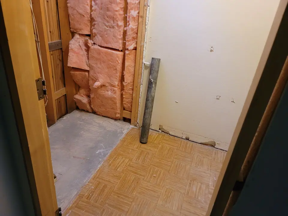 Bathroom rebuild with a skylight well and wood vanity, photo 6 of 11 (demolition)