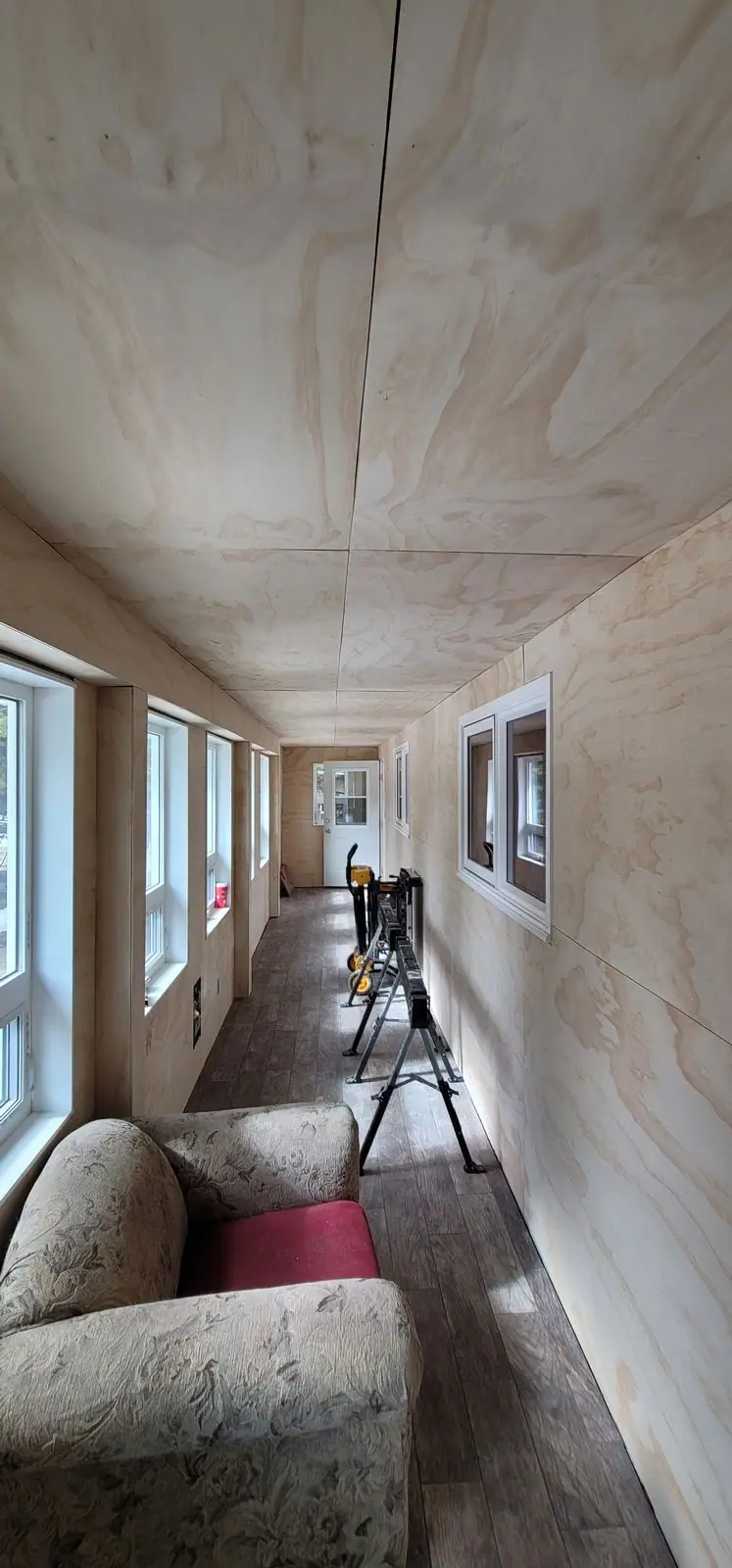 Panelled sunroom with new window trim, photo 3 of 7