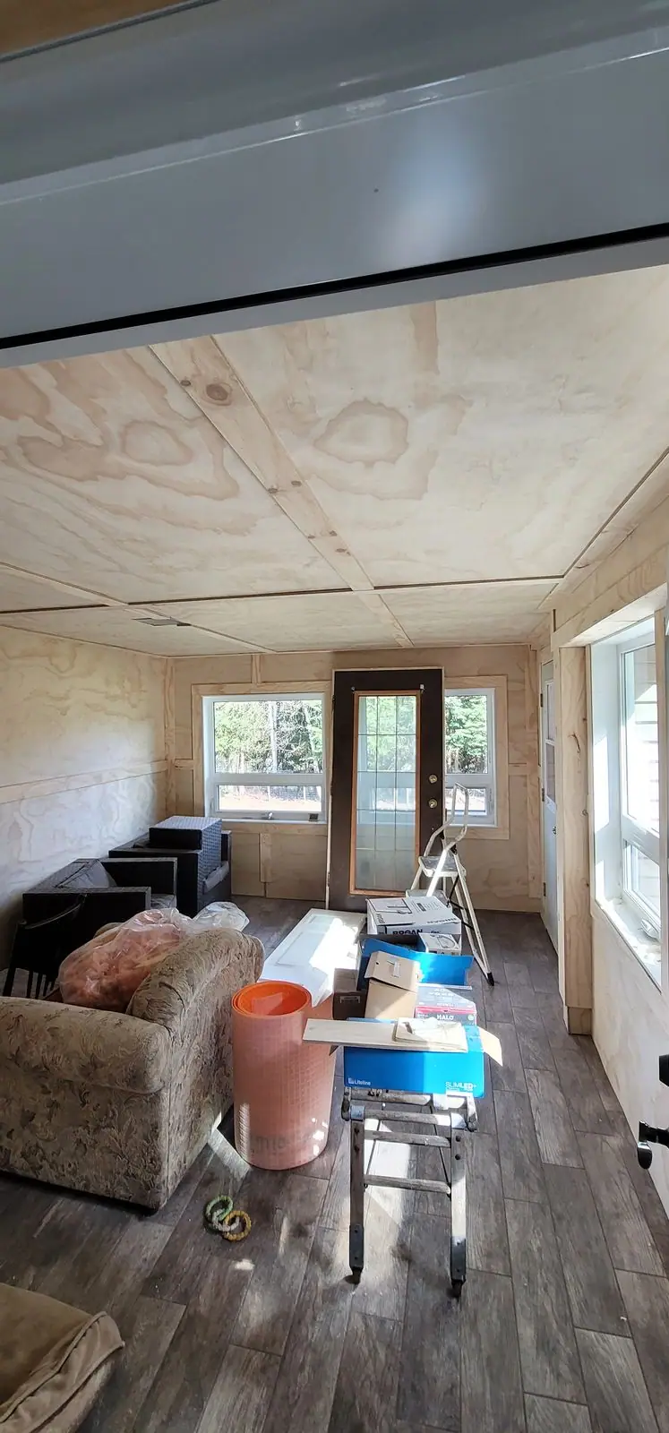 Panelled sunroom with new window trim, photo 5 of 7