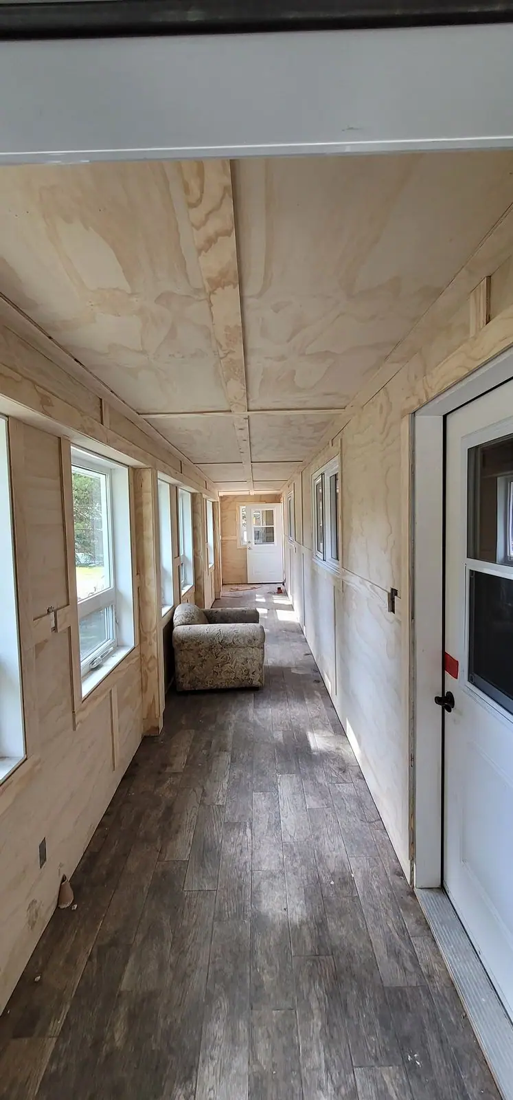 Panelled sunroom with new window trim, photo 6 of 7