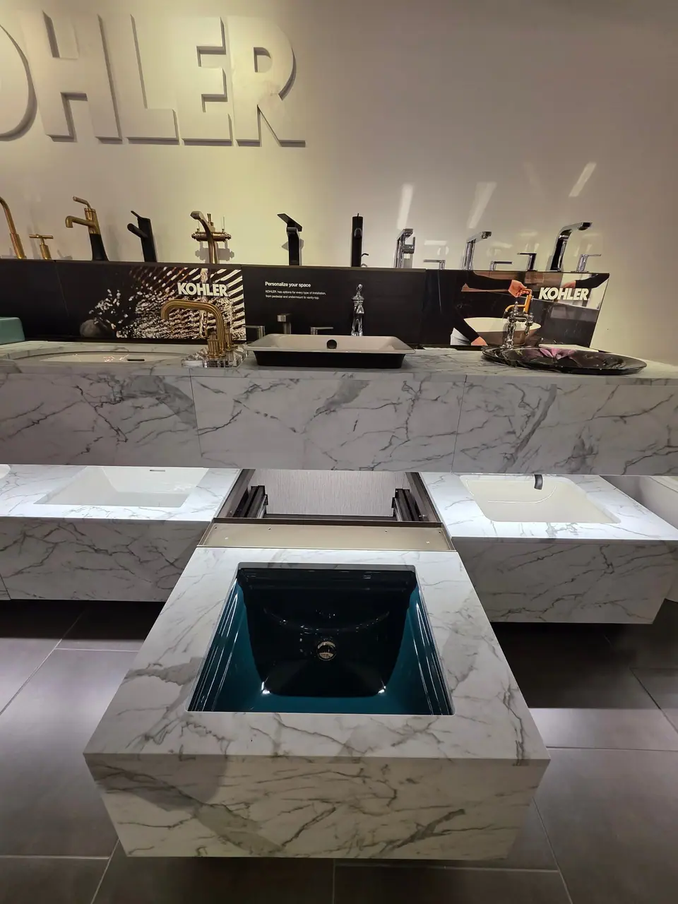Bathroom sinks, faucets and vanities in a KOHLER fixture showroom