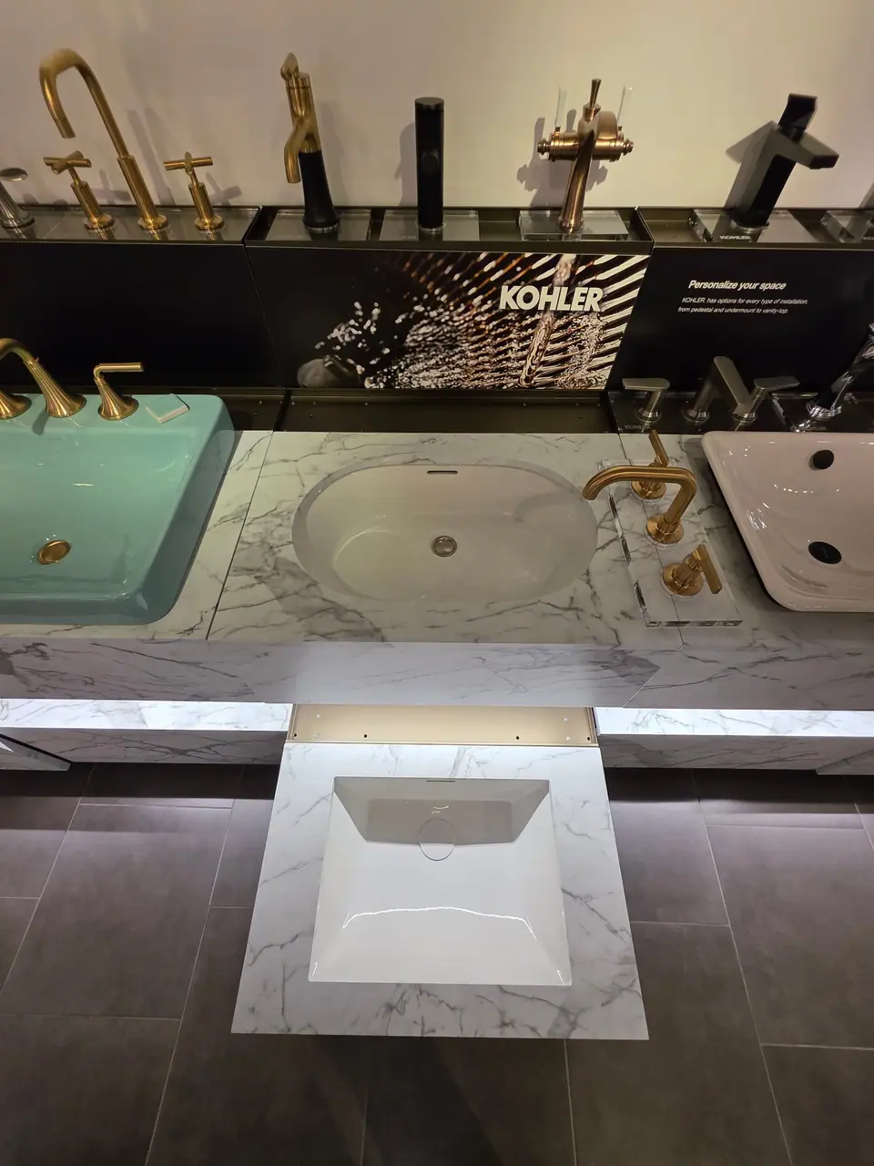Bathroom sinks, faucets and vanities in a KOHLER fixture showroom