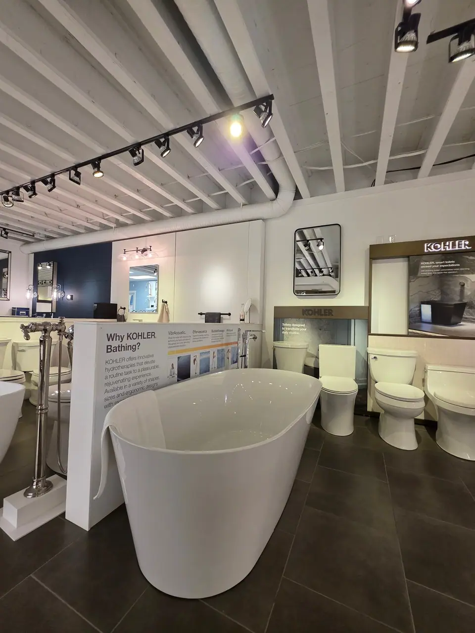 Bathing in a KOHLER fixture showroom
