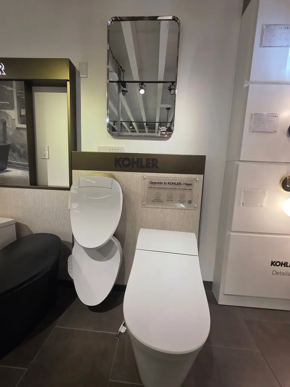 Toilets and bidet seats in a KOHLER fixture showroom
