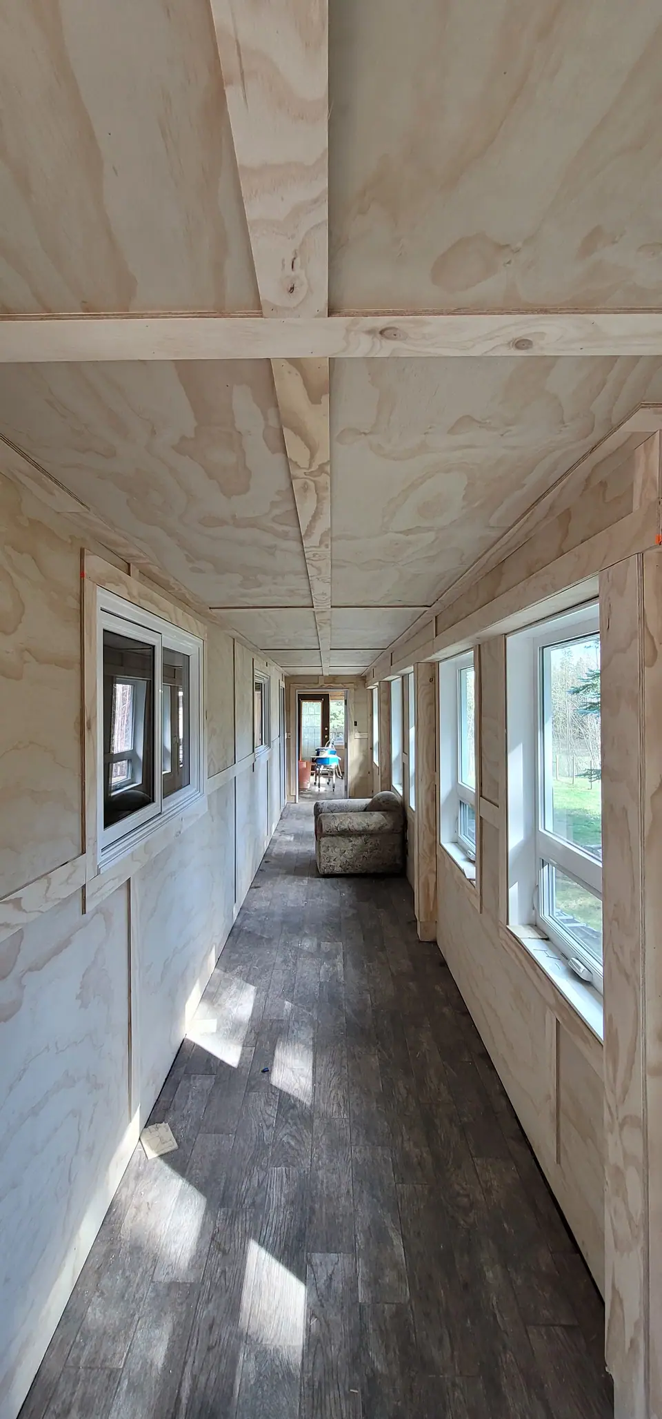 Panelled sunroom with new window trim: Zenith job-site photo